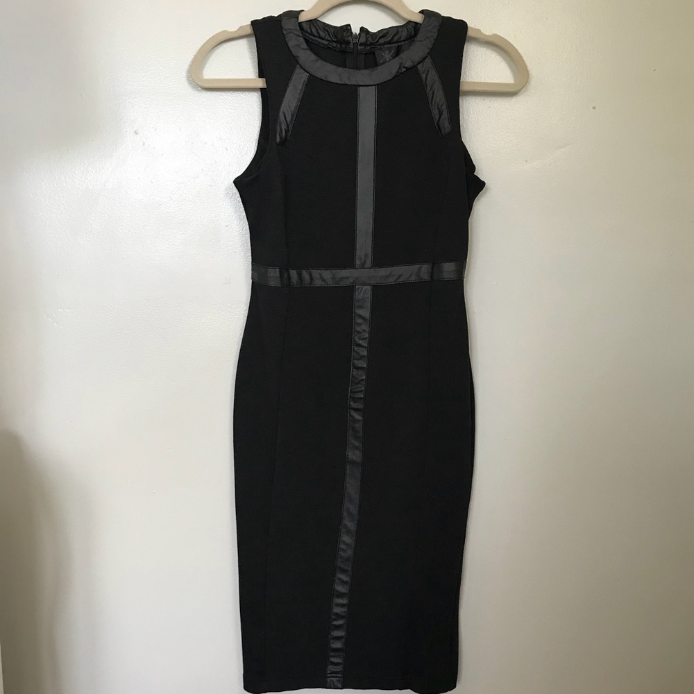 Black knee length Kardashian Dress.